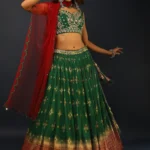 Bottle Green Lehenga In Silk With Patola Printed Buttis And Woven Maroon Border